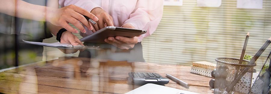 Someone using a ipad to look at useful links for accounting
