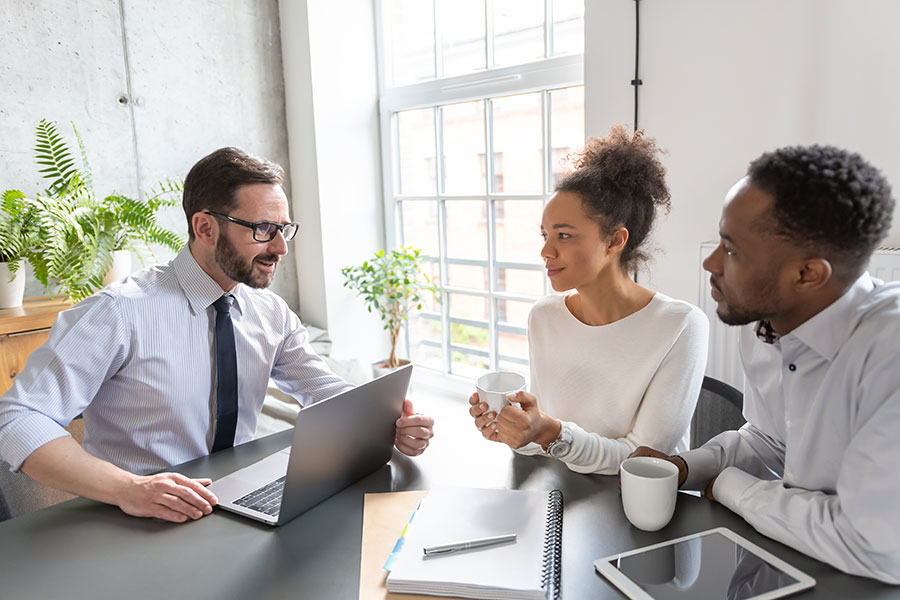 accountant in discussion with clients