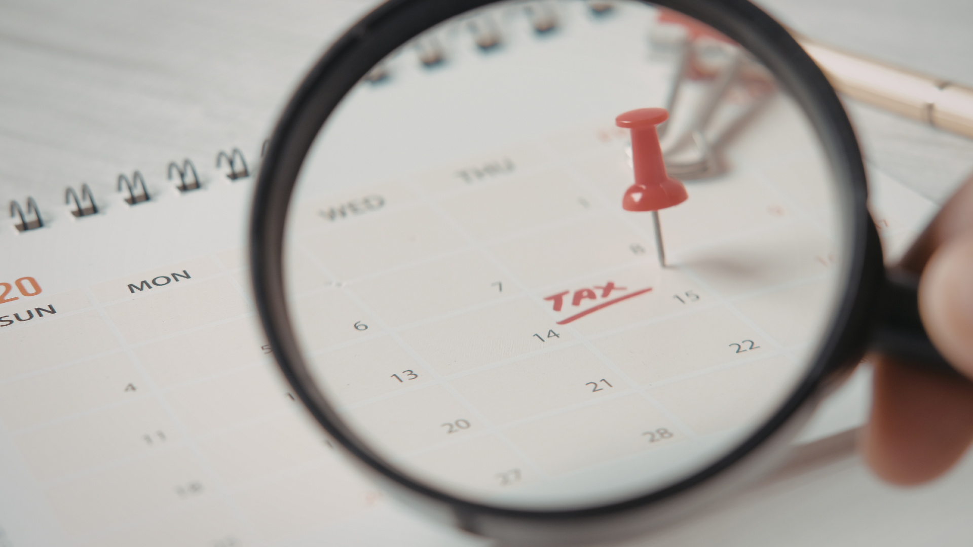 Calendar with a tax date marked and magnified, representing the new UK tax year changes from 6 April 2026